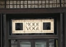 Vergoldetes Firmenschild